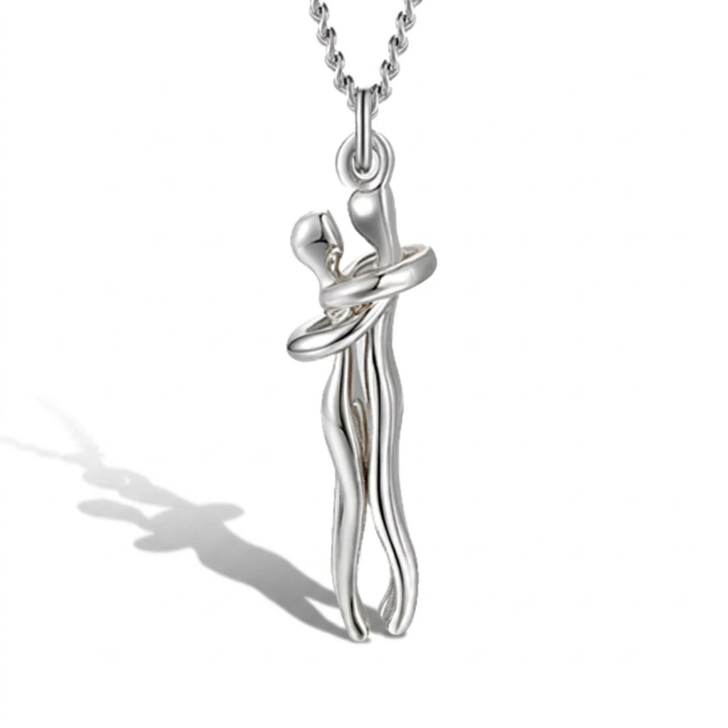 Silver Hug Me Tight necklace pendant shown from the side