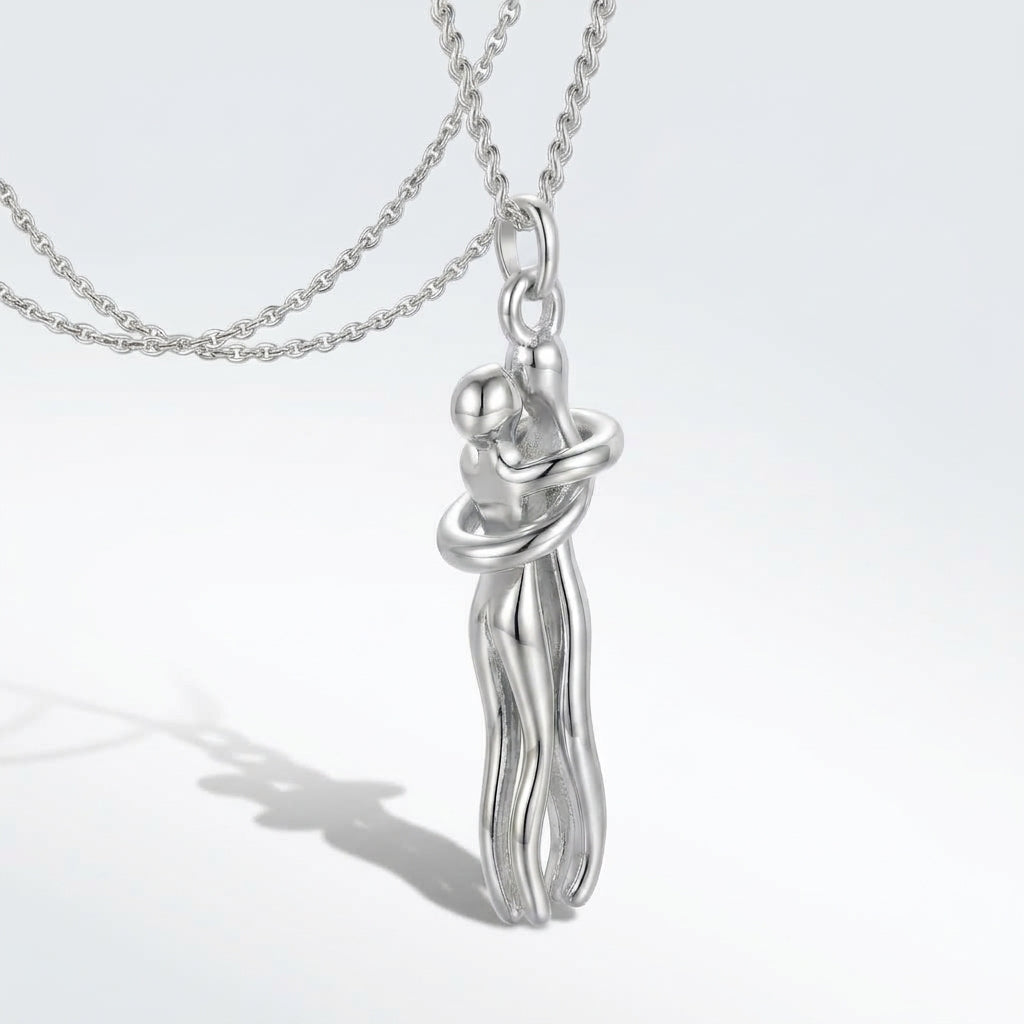 Silver Hug Me Tight necklace with a soft 3D shadow