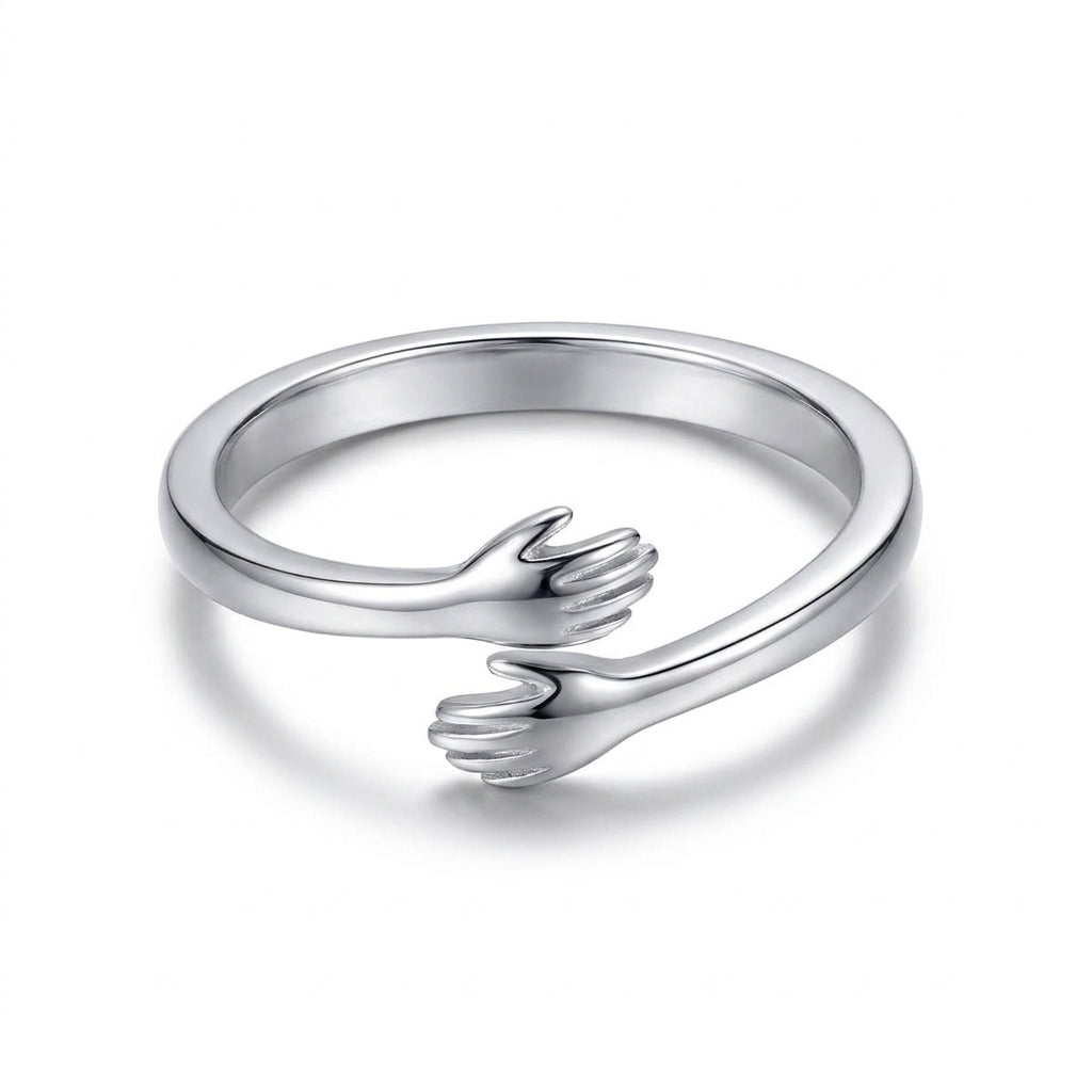 Silver Hug from Heaven ring on a white background