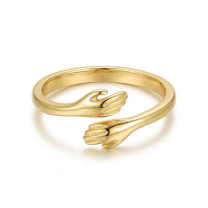 Gold hug ring in 925 sterling silver on a white background
